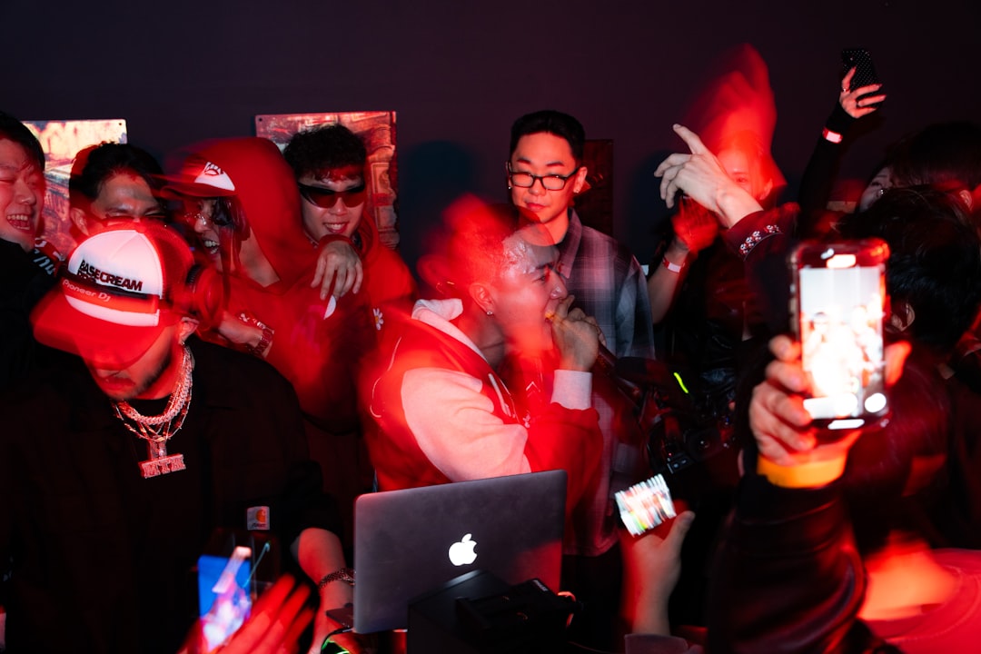 Team of gamers with headsets celebrating - photo by @dial__heavyweight (IG)