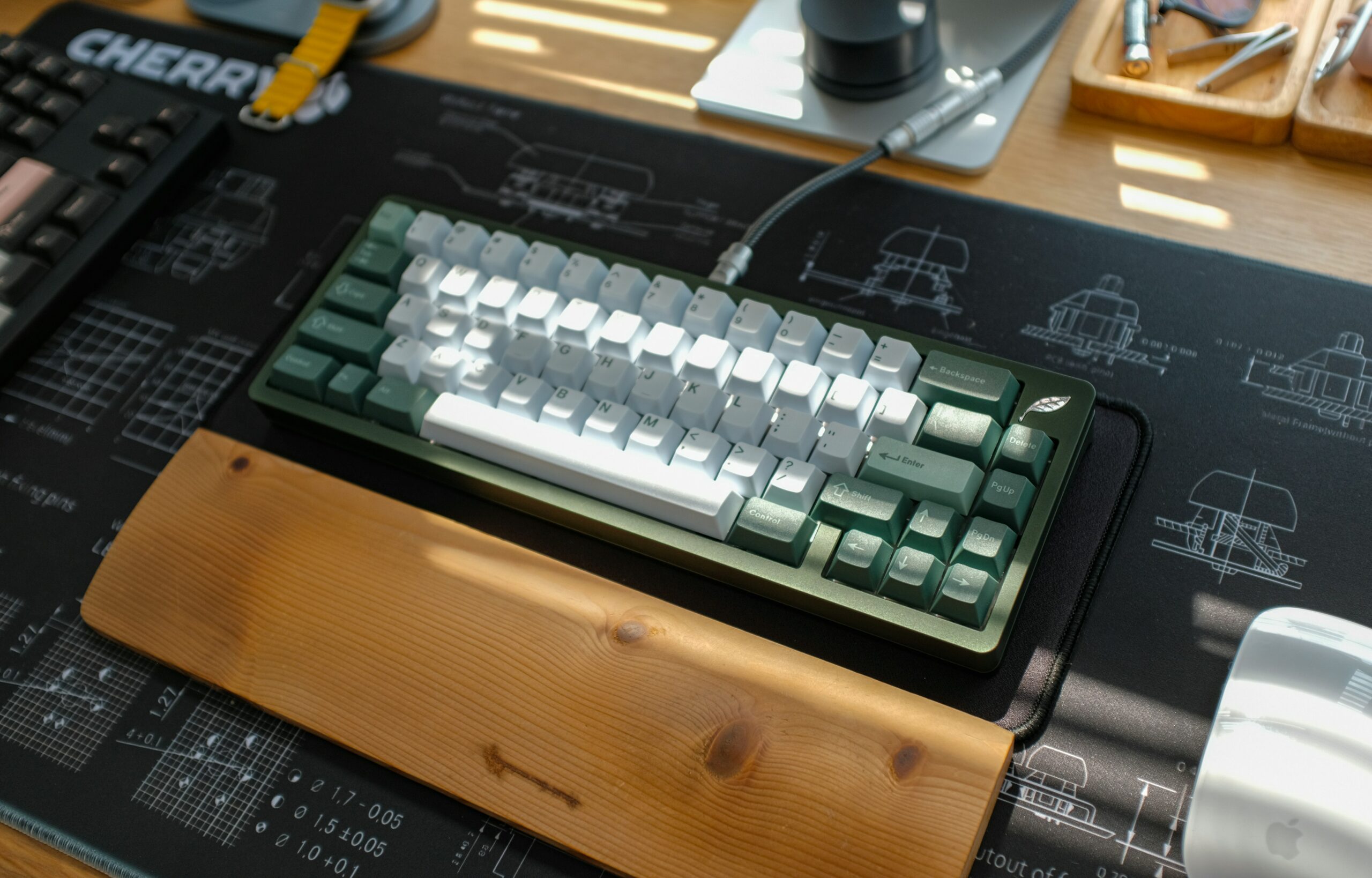 Close-up of mechanical keyboard switches - A mechanical keyboard sits on a desk mat.