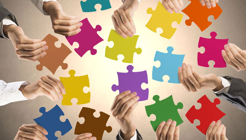 Small team of indie game developers collaborating - What Makes a Winning Game Development Team?